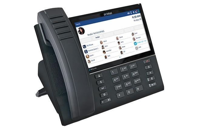 Executive Open SIP desk phone with a 7-inch (800x480) capacitive touchscreen, built-in Wi-Fi plus wired Gigabit Ethernet, and Bluetooth headset support. Offers Mitel PCLink and MobileLink integration for PC and mobile audio, and works with third-party SIP platforms such as RingCentral, 8x8, and Zoom.